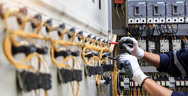 Professional Electrician technician working in Phenix City, AL